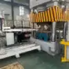 Presswood pallet machine 1600 tons with automatic arm for pallet demolding