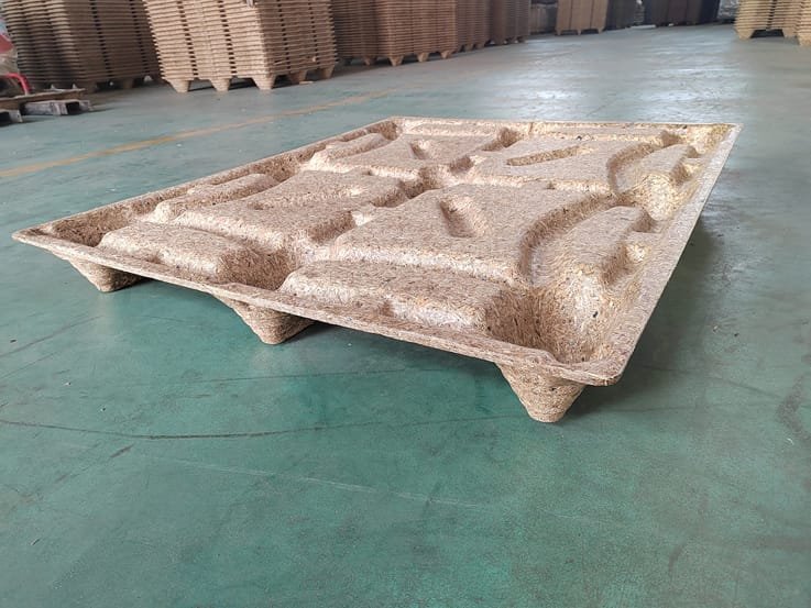 a presswood pallet on the ground