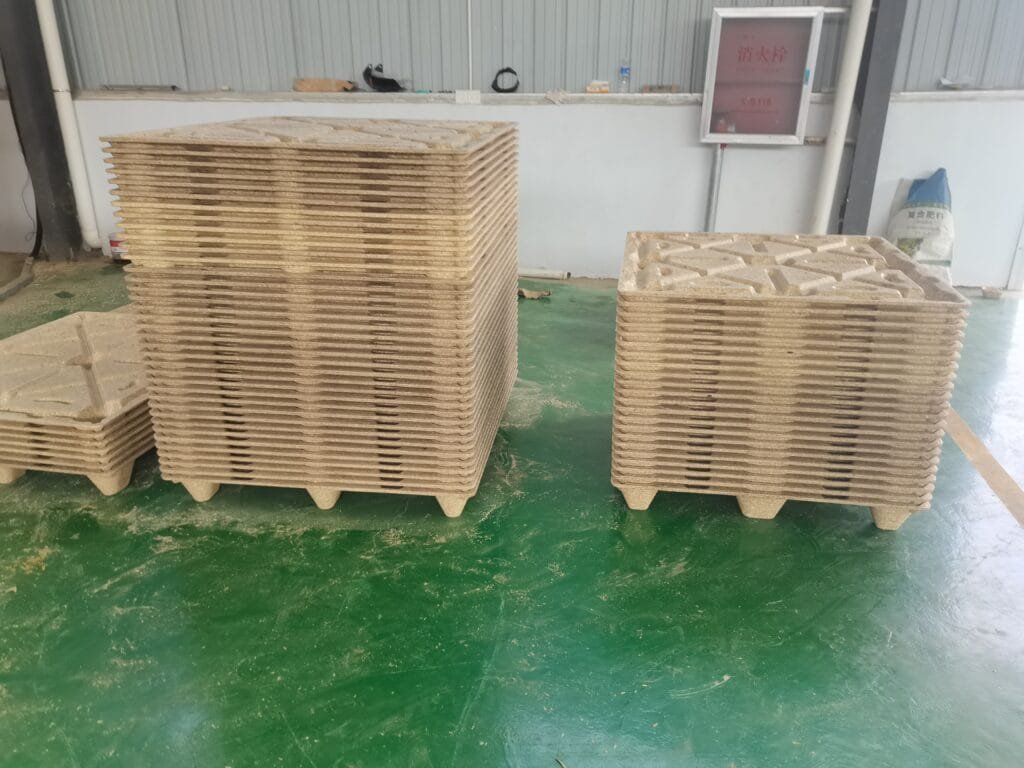 two stack of presswood pallets